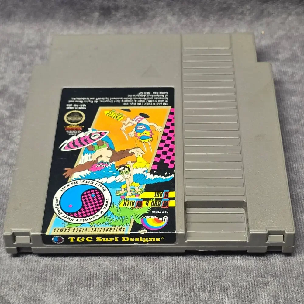 T&C Surf Designs: Wood & Water Rage Nintendo NES Video Game Cartridge Japan